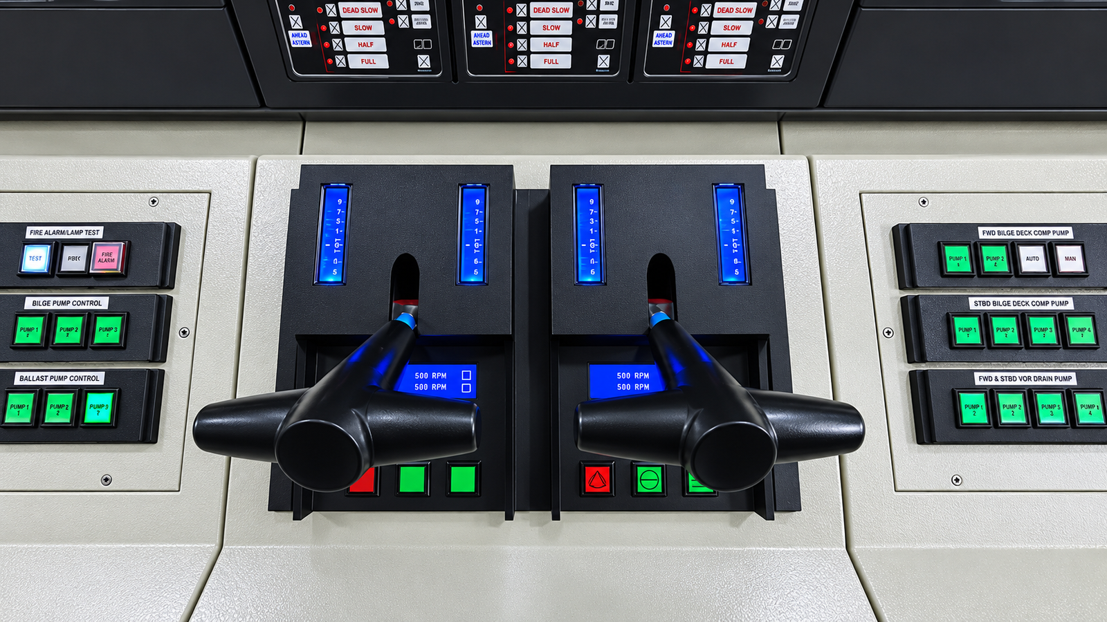Dual propulsion control levers and machinery control panels of the IPMS training simulator.